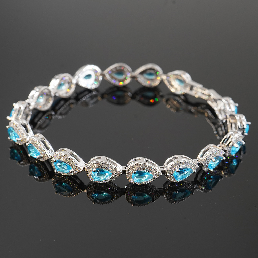 NORVIA Pavé Heart CZ Diamond Tennis Bracelet - Premium Iced Jewelry View 1
