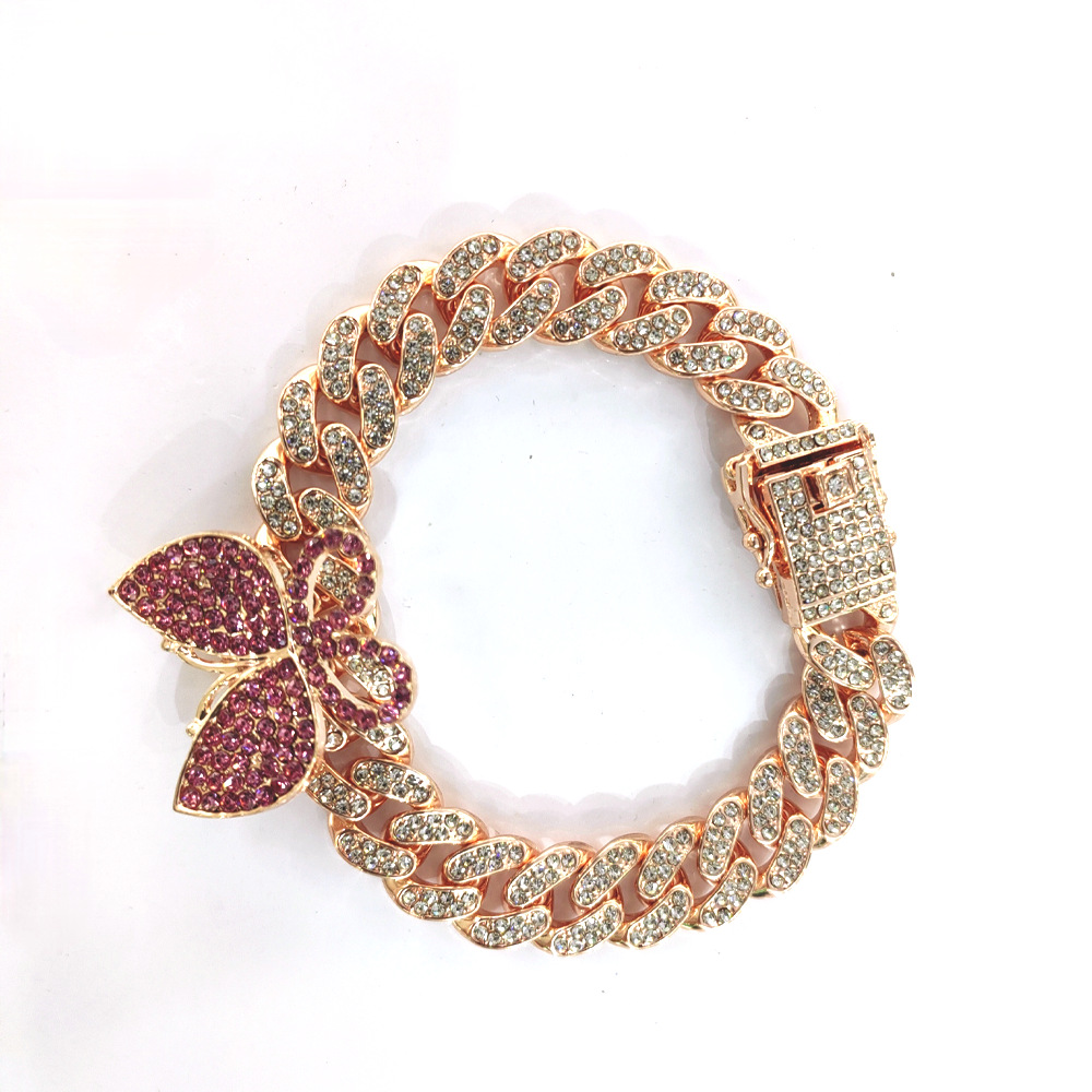 NORVIA pink butterfly Cuban chain jewelry worn